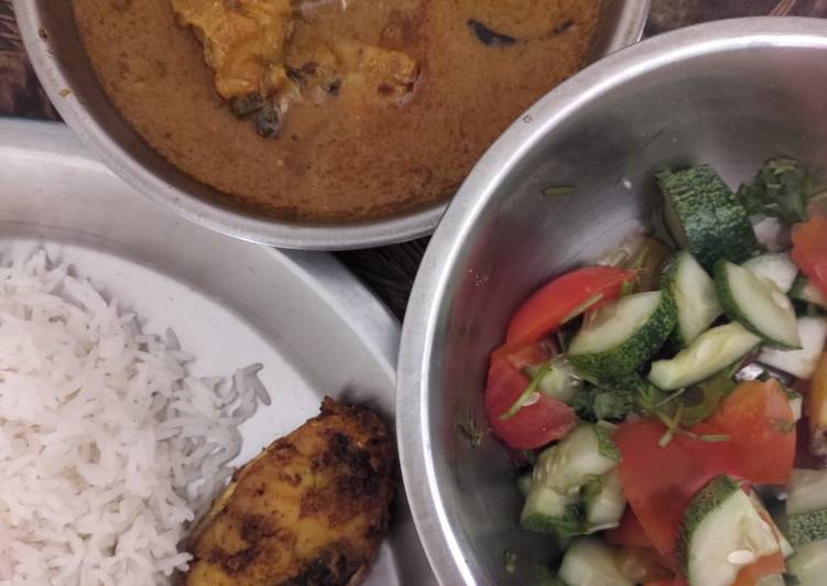 Homemade Salmon fish fry and curry with rice