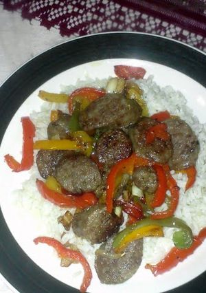 A picture of Sausage, Peppers & Onions w/ Rice.