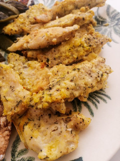 Una foto de Pollo al horno rebozado con almendra