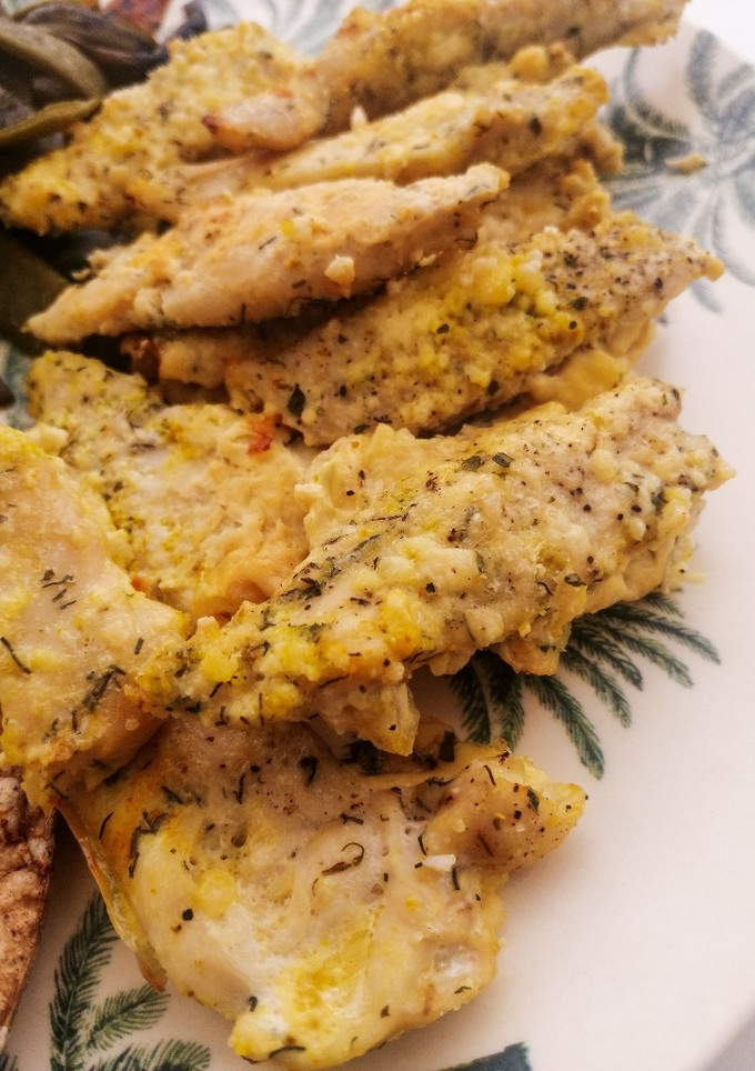 Una foto de Pollo al horno rebozado con almendra
