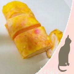 A picture of Salmon Pink Tamagoyaki Made with Leftover Sakura Denbu.