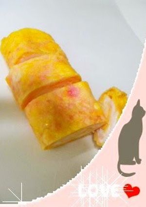 A picture of Salmon Pink Tamagoyaki Made with Leftover Sakura Denbu.