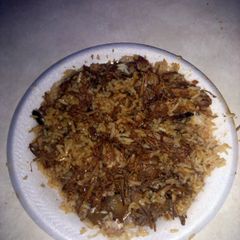 A picture of Barbeque pulled pork over rice.