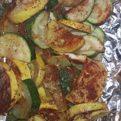 A picture of Fire pit Zucchini and yellow squash.