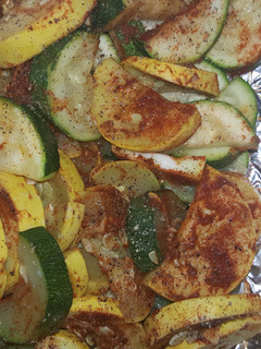 A picture of Fire pit Zucchini and yellow squash.