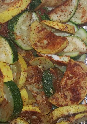 A picture of Fire pit Zucchini and yellow squash.
