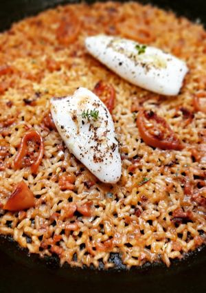 Una foto de Arroz con calamarcitos