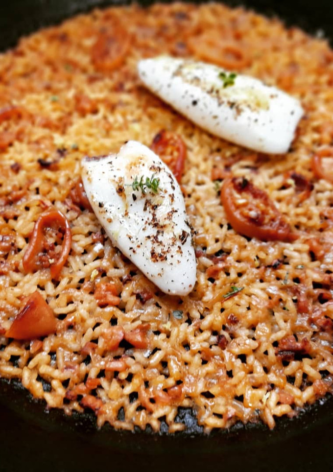 Una foto de Arroz con calamarcitos