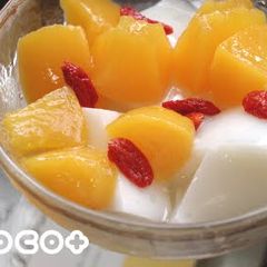 A picture of Annin Dofu (Almond Flavored Jelly) with Loquat Kernels.