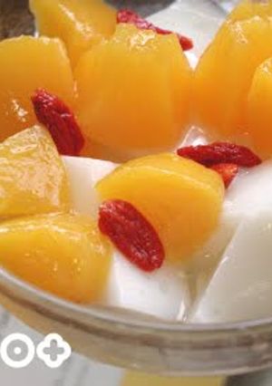 A picture of Annin Dofu (Almond Flavored Jelly) with Loquat Kernels.