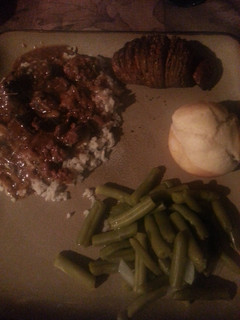 A picture of Beef tips and rice.