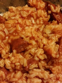 A picture of Saucy Sausage and rice.