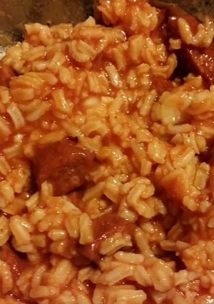 A picture of Saucy Sausage and rice.
