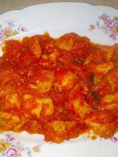 Una foto de Magro con tomate