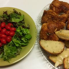 A picture of Simple Salad with chicken and garlic toast.