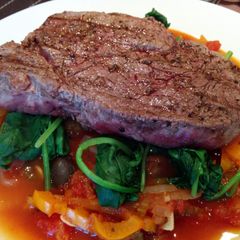A picture of Seared steak with celery & pepper caponata.