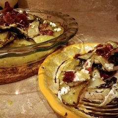 Potato pie stuffed with chicken, goat cheese and kale A picture of Potato pie stuffed with chicken, goat cheese and kale.