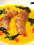 Vellutata di zucca e cavolo nero con gamberoni fasciati al rigat