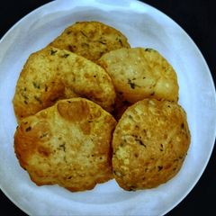 A picture of Poori with Leftover Potato Sabji.