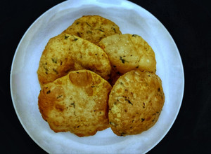 A picture of Poori with Leftover Potato Sabji.