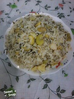 صورة لوصفة رز باقلاء (فول اخضر) من ايدي
