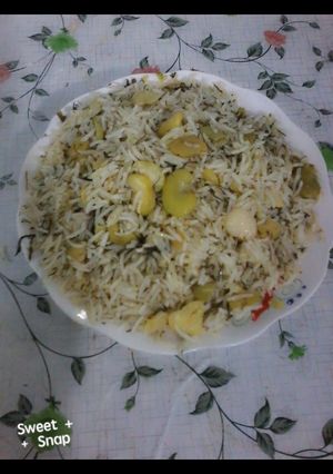 صورة لوصفة رز باقلاء (فول اخضر) من ايدي