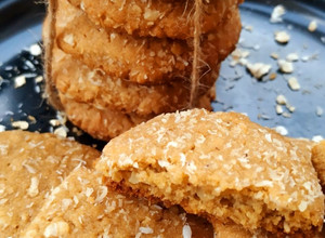 A picture of Jaggery Oats Wheat Coconut Cookies.