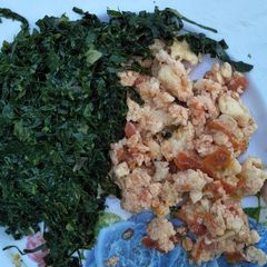 A picture of Sukuma wiki with eggs.