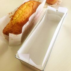 A picture of How To Neatly Line a Cake Pan with Parchment Paper.