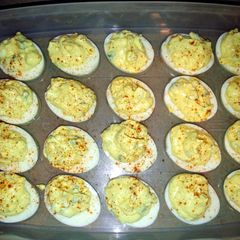 A picture of Deviled eggs with jalapeno.