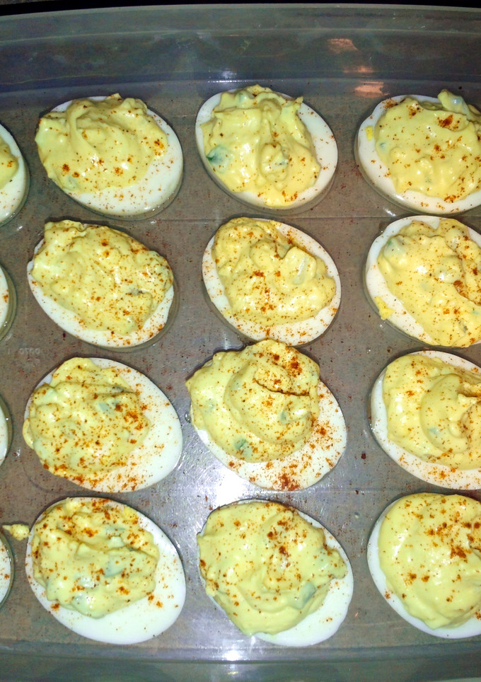 A picture of Deviled eggs with jalapeno.