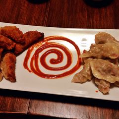 A picture of Spicy Pork Asian Dumplings.