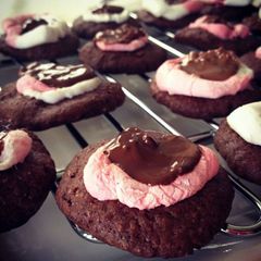 A picture of My specialty triple chocolate cookies with marshmallows.