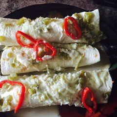 A picture of Chicken Enchiladas With Sour Cream White Sauce.