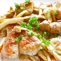A picture of Tender Pork Tenderloin and Mushrooms Sautéed in Butter.