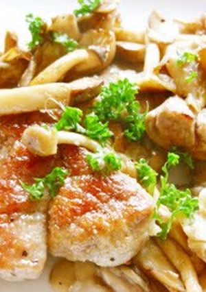 A picture of Tender Pork Tenderloin and Mushrooms Sautéed in Butter.