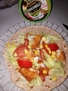 Una foto de Fajita con filete de pollo empanado