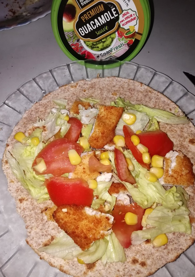 Una foto de Fajita con filete de pollo empanado