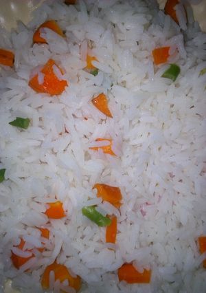 A picture of White rice with veggies.