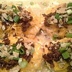 A picture of smothered chicken.