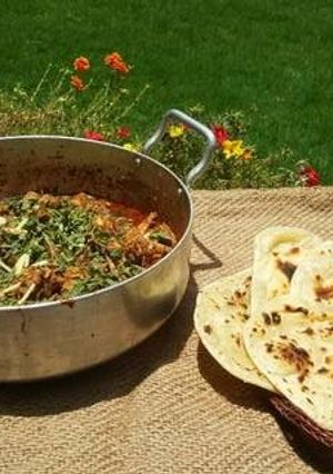 A picture of Peshawari charsi karahi with tawa naan..