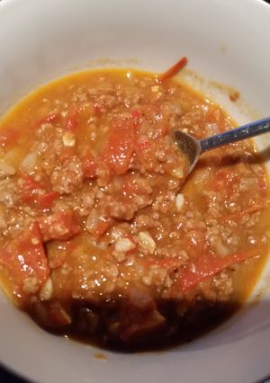 A picture of Warming Bolognese with chorizo.