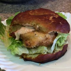 A picture of Buffalo Chicken On Pretzel Bun.