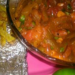 A picture of Matbucha- sweet n spicy Arabic dip with pumpkin french fries.