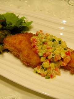 A picture of Salmon Meunière with a Simple and Colorful Vegetable Sauce.