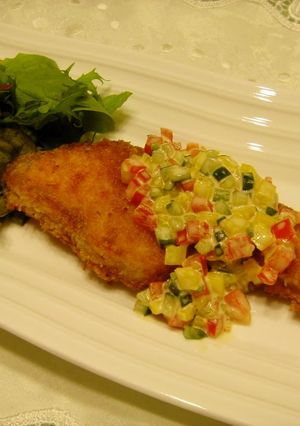 A picture of Salmon Meunière with a Simple and Colorful Vegetable Sauce.