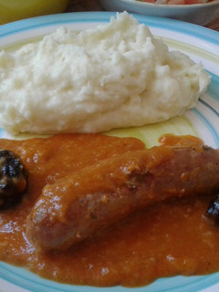 Una foto de Longaniza en salsa con frutos secos