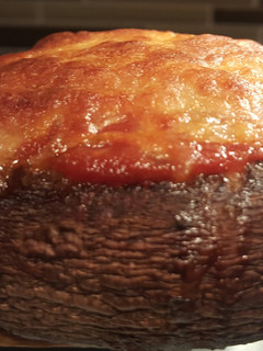 A picture of Veggie stuffed portebella mushroom.