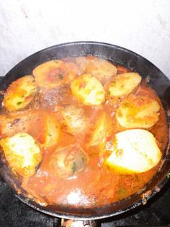 Una foto de Papas en Salsa