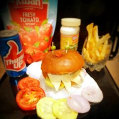 A picture of Oats Veggie Cheesy Burger.
